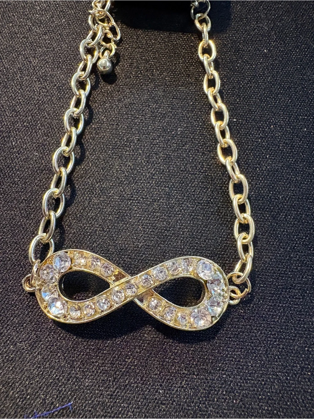 Gold Tone Infinity Crystal Bracelet and Earring Set